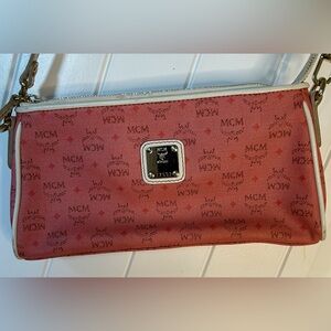 MCM mini purse also comes with a crossbody strap